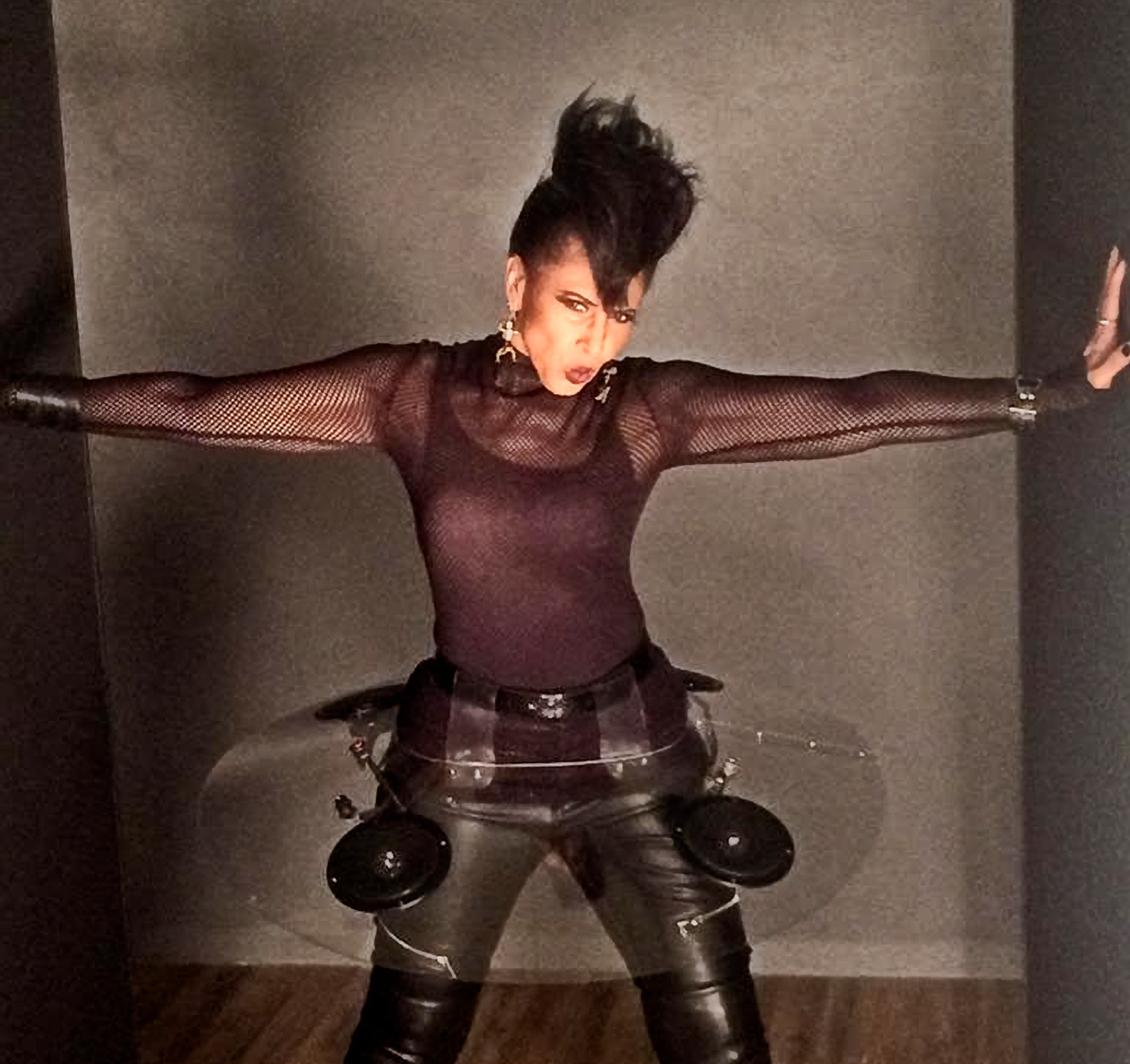 Nona Hendryx striking a pose with her arms stretched out to the side