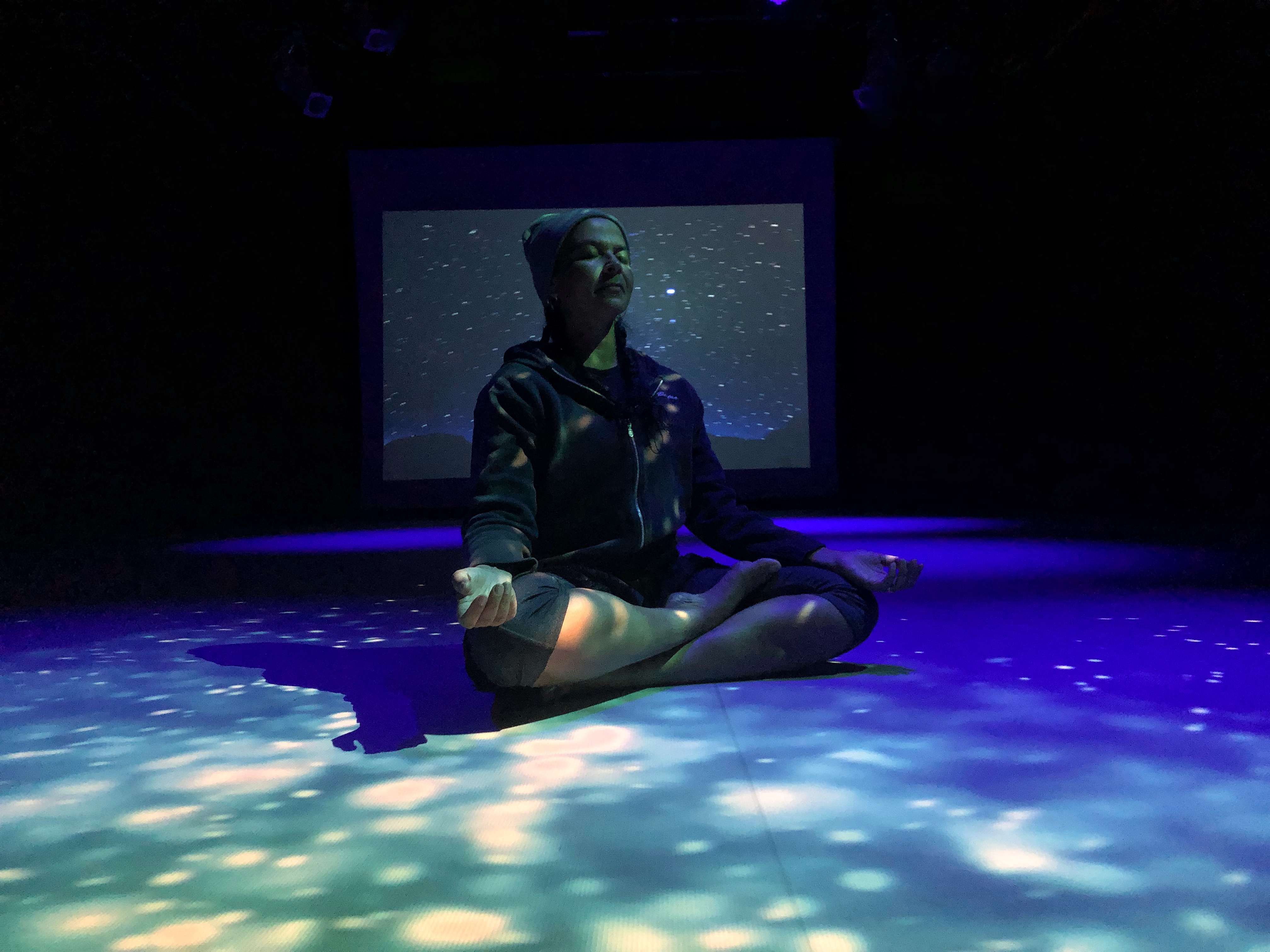 woman sitting during Stillness Lab